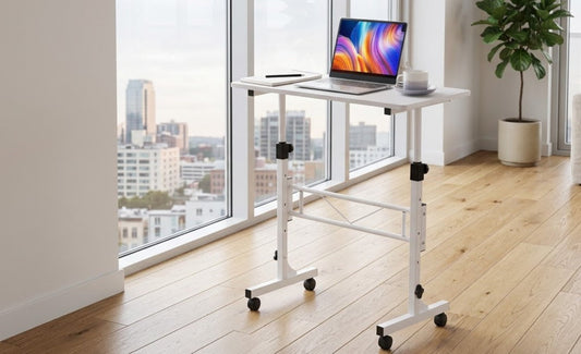 Height-adjustable mobile standing desk positioned in a bright home corner as a flexible work zone
